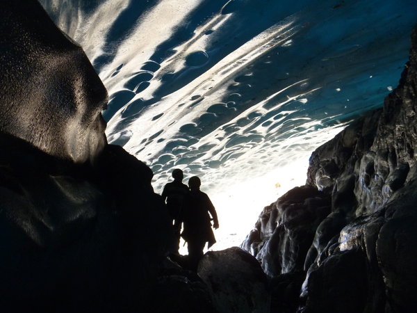 From inside an ice cave at the edge of the glacier