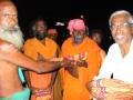 Swami and Annamalai handing out Blankets
