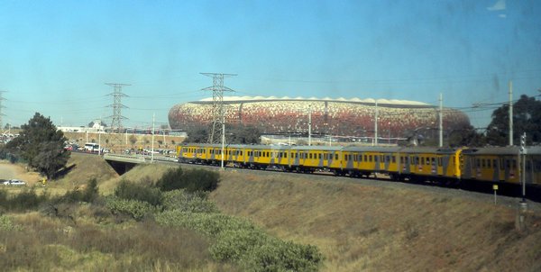 The trains snakes its way towards the stadium