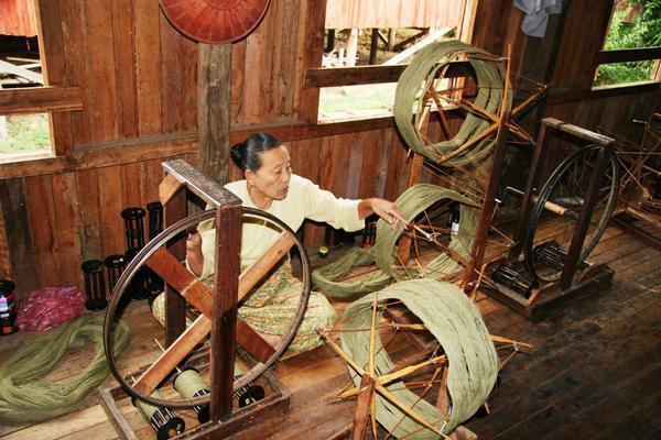 Spinning silk at the silk factory