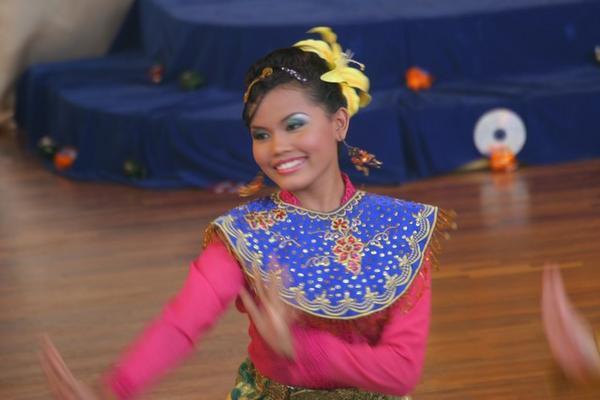 Pretty young lady in another traditional dance at Mini malaysia