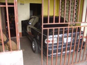 this is what Costa Ricans do when their car doesn't fit in their garage