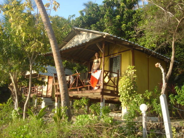 Steph and our humble bungalow - $8 a night