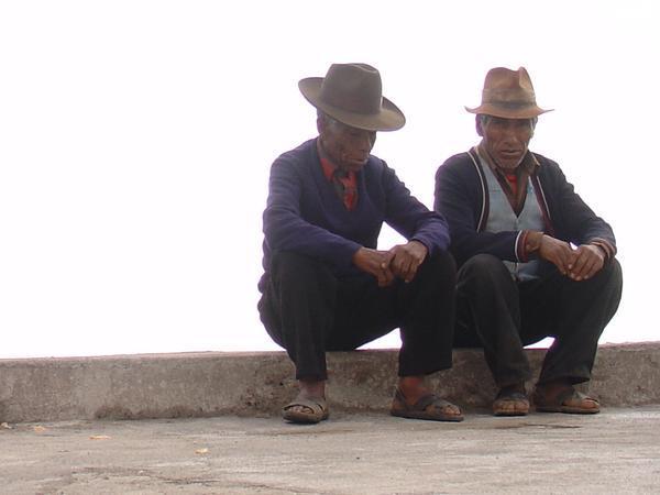 Couple of local men sitting on the warf