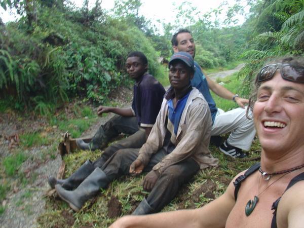 We bummed a ride with these guys out to the water hole, they were taking a load of topsoil up into a hill on the jungle so the could plant grass on a hillside where they would later plant certain "crops"