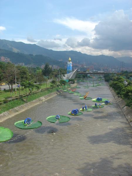 One of the rivers of medellin, decorated up with lights for the 7th