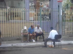 old mates eating oranges