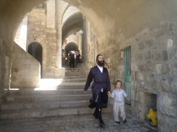 A Jewish person with a child