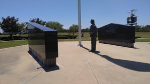 The Panel on the Right Honors Those from Mobile and Baldwin Counties While the Panel on the Left Honors All Other Alabamans Who Lost Their Life in Vietnam – The Old Veteran “Remembers” While the Huey Hovers in Wait