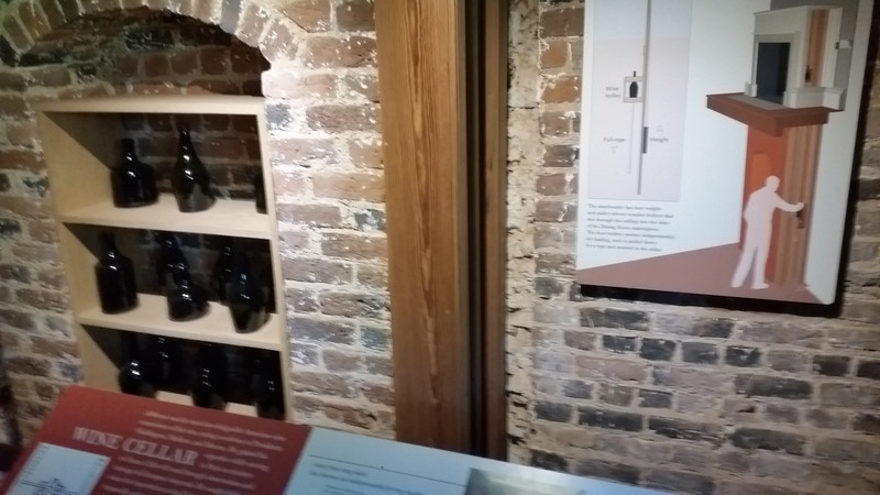 The Wine Room Has a Dumbwaiter (Center) So Wine Bottles Can Be Hoisted to the Main House – The Operation Is Explained on the Right