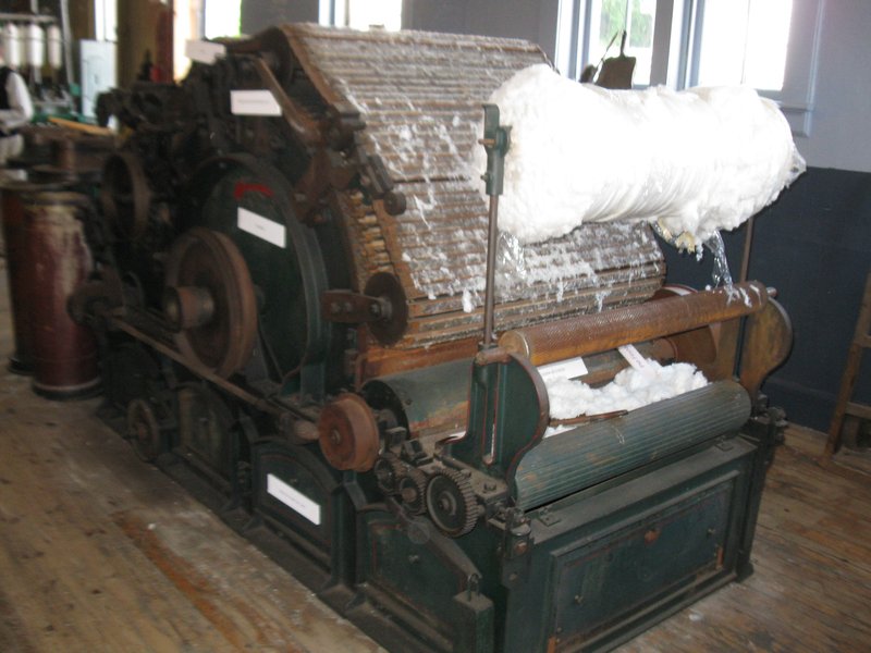 The Carding Machine Combs And Brushes The Cotton Fibers