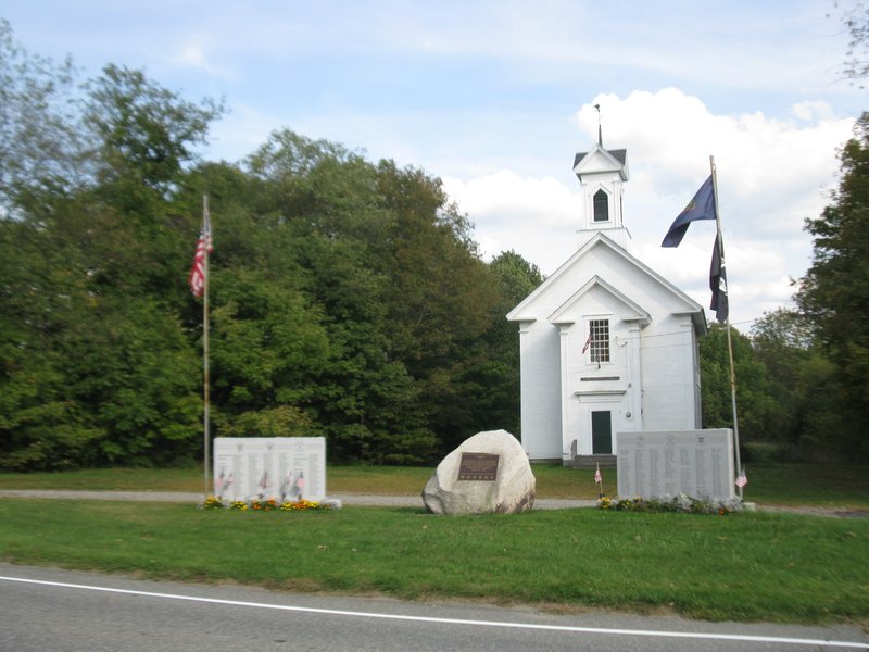 Veterans Memorial With Albany Historical Society Building In The Background