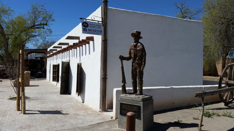 Billy The Kid Stands Outside The Museum Building – The Jail Is At The Far End