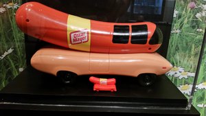 A Model Of The The Oscar Mayer Wienermobile Driven About The U.S. By Meinhardt Frank Raabe –  "Little Oscar, the World's Smallest Chef"