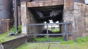The Ore Dropped From The Hopper Into Ore-Carrying Rail Cars For Transport