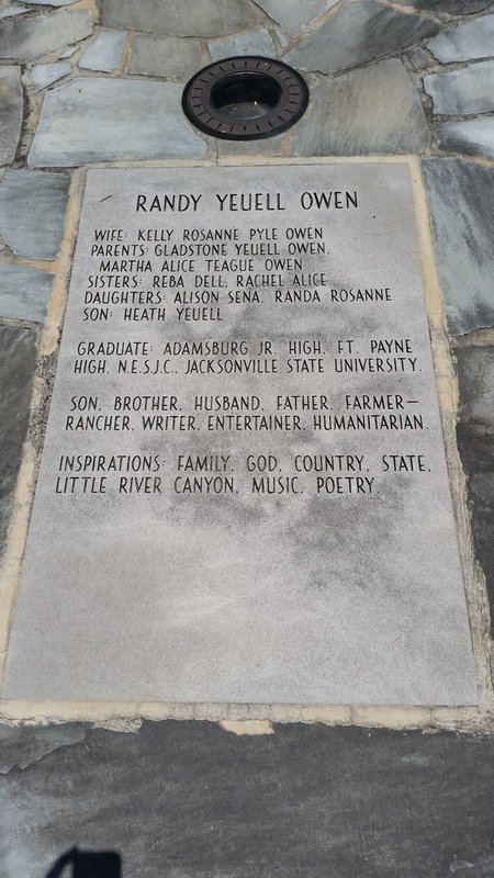 A Short Bio Of Each Band Member Is Immediately In Front Of His Statue – This, Randy Owen