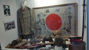 Displays With German And American Artifacts Are Adjacent To This Display Of Japanese Military Gear