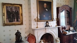 Washburn’s Likeness Is Prominent Above The Fireplace