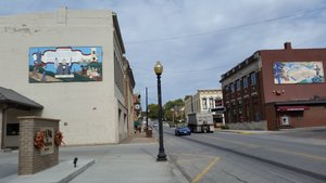Several Murals Are Placed Above Parked Cars But That Makes Them Difficult To Examine Closely And To Photograph