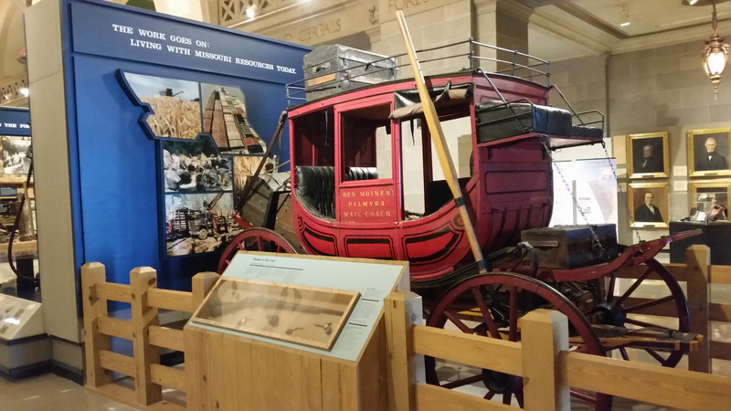 This Exhibit, “The Work Goes On:  Living With Missouri Resources Today” – A Stagecoach???  Spare Me!