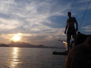 Diving off the boat at sunset