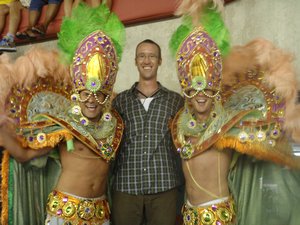 Chuck posing with some dancers