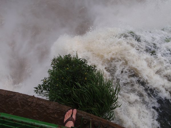 Feet overlooking the Falls on the Brazil side