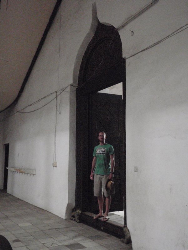 Chuck posing in one of the huge doorways in the House of Wonders