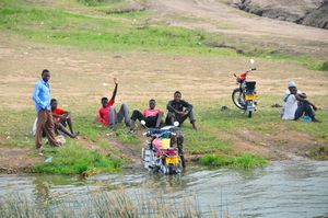 Washing the motorcycles, Kazinga style!
