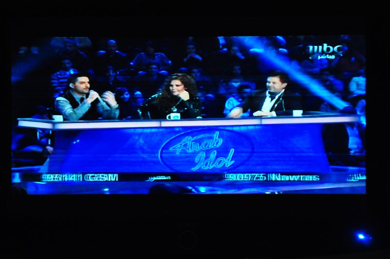 Watching Arab Idol on TV in our suite