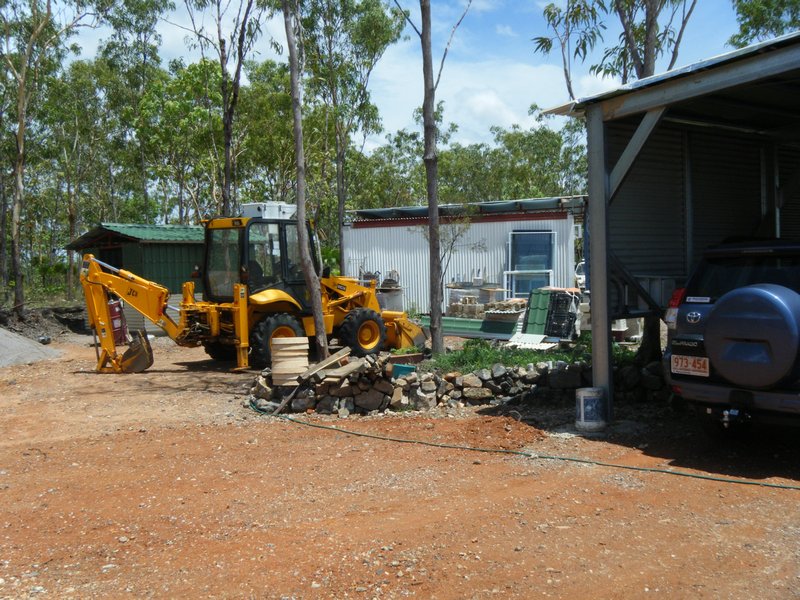 JCB and outbuildings