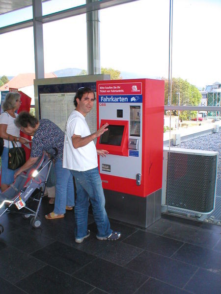 Tito struggling to buy the train tickets