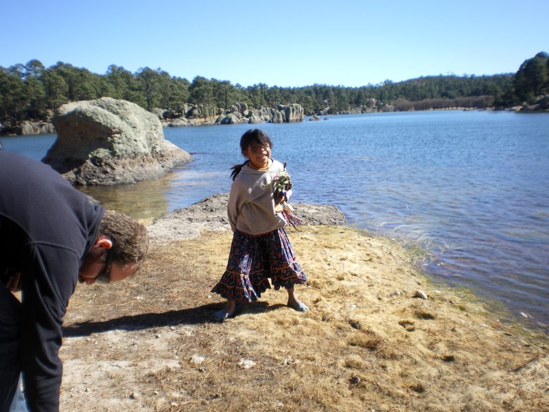 Local girl skipping stones with us