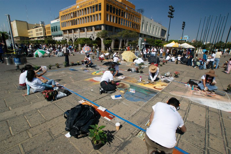 Students drawing in the square