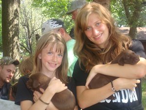 109. Emily and me with puppies