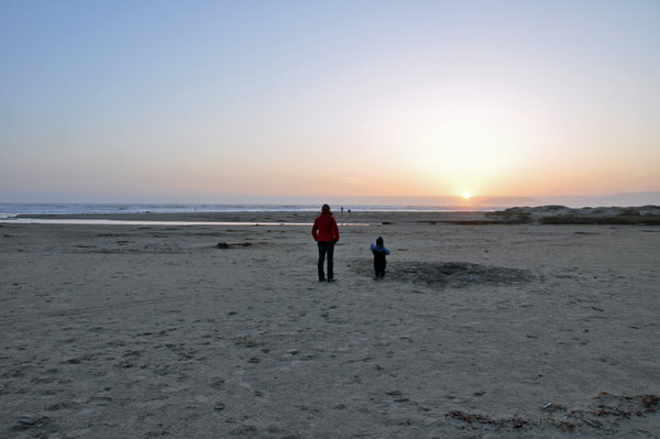Lucille and Jack taking in the sunset on Pismo Beach - our site was right behind.