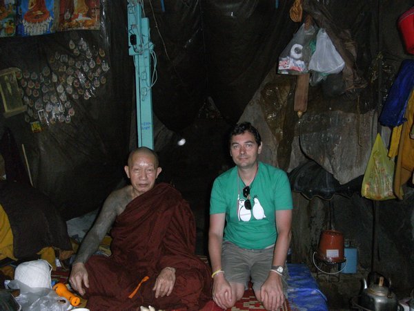 with monk in cave
