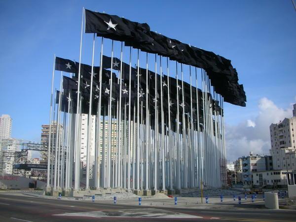 Black flags in front of the US Interests Section