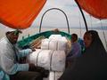 Taking 1000 mosquito nets to Tufa on the boat