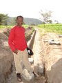 Seife, my co-worker,  and his irrigation canals!!