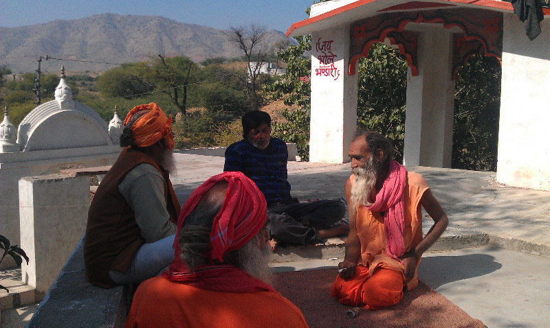 Alu Baba (right) holding court on the terrace