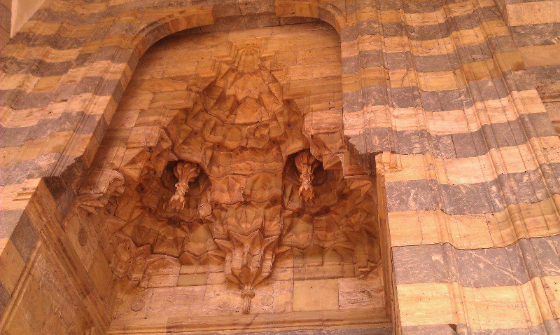 Exquisite stone alcove above mosque entry in Tokat