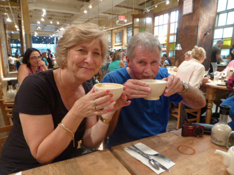 Ken and Noveen with their huge coffee cups