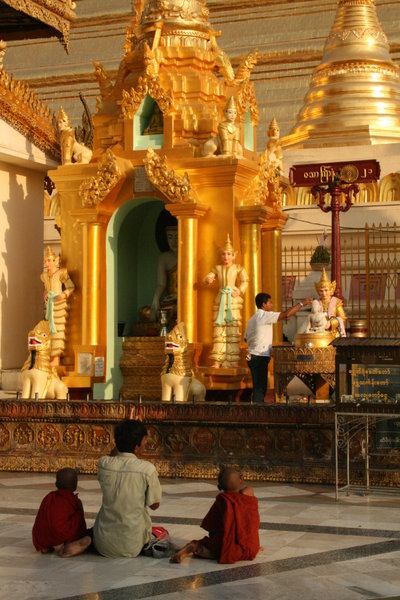 Gold and little monks