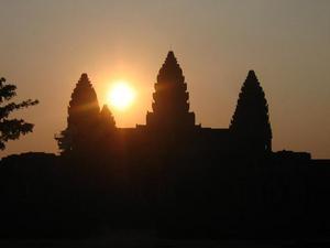 Sun setting behind Angkor Wat