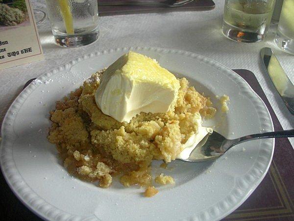 Apple Crunble with Clotted Cream. Small engish pub, England