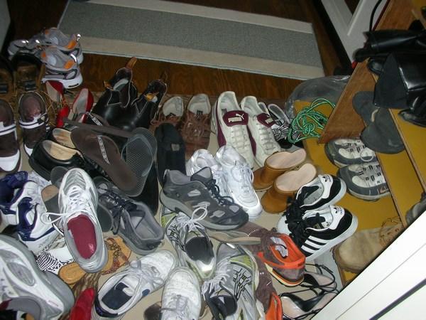 The pile of shoes on the floor