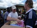 Drew with Hugh at our first clothes distribution