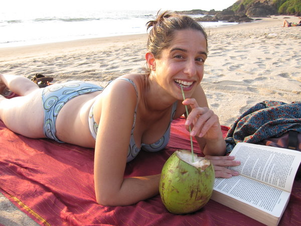 Mel enjoys a refeshing coconut on little Arambol beach