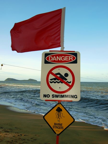 Warning Sign on the Beach